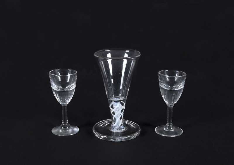 Three antique glasses, including air twist stem wine glass and pair of toasting glasses, early to mid 19th century