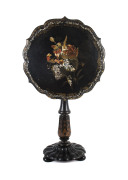 A tilt-top wine table, ebonized papier mache with hand painted finish, circa 1825