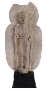 A Chinese Guanyin statue, carved hardstone with remains of polychrome finish