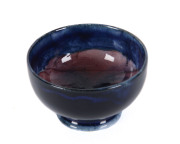 MOORCROFT Pansy patterned miniature bowl on blue ground, circa 1920s