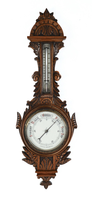 An English banjo aneroid barometer in oak case, 19th century