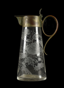 An English claret jug, intaglio cut crystal with silver plated mount, 19th century