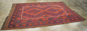 An Afghan Kilim flat weave tribal rug