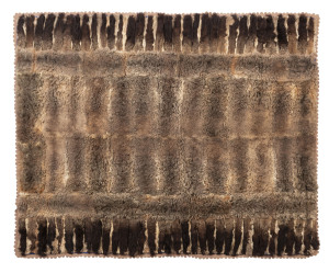 An Australian possum skin buggy rug with brown baize backing, late 19th early 20th century