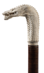 A walking stick with carved antler handle in the form of a dragon, fiddleback blackwood shaft, 20th century