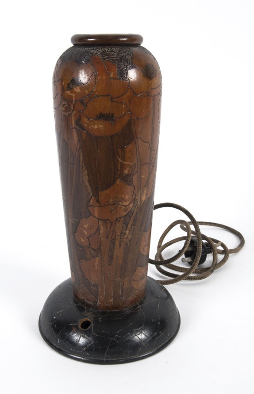 A pokerwork table lamp base, circa 1920