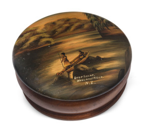 A New Zealand treen ware jewel box with hand painted Moari scene titled "Drop Scene, Wanganui River, N.Z.", 19th century