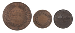 Three Exhibition medals: 1930, 1931 and 1932, awarded to "Rueben Laws, Emobssed and Sandblasted Glass" together with a "Lounge" sign example of Laws' work,