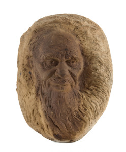 WILLIAM RICKETTS Pottery face plaque of an elder, reverse decorated with Pikanini childs face