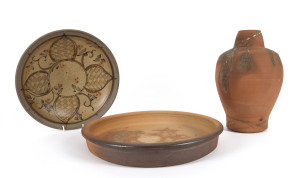 Two studio pottery platters and a terracotta vase