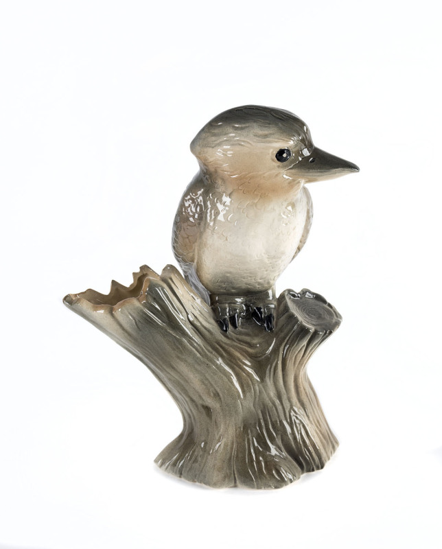 A kookaburra slip cast ceramic tree stump vase, 20th century