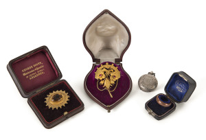 JAMES SCOTT Family jewellery comprising a fine Australian 15ct gold and ruby brooch in original box circa 1850s, a Scottish gold and citrine brooch in original box, a sterling silver sovereign case engraved with Scott monogram; and an unusual wedding band