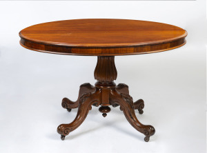 A Colonial tilt-top oval supper table with unusual carved column and base, blackwood, Tasmanian origin, mid 19th century