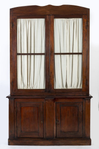 The Captain's bookcase, cedar, Melbourne origin, mid 19th century, this primitive bookcase is purported to have been made for a sea captain who resided in an old house (c1850s) on the corner of Yewer st and Moreland street on the banks of the Maribyrnong 