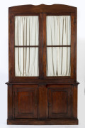 The Captain's bookcase, cedar, Melbourne origin, mid 19th century, this primitive bookcase is purported to have been made for a sea captain who resided in an old house (c1850s) on the corner of Yewer st and Moreland street on the banks of the Maribyrnong