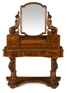 A Victorian dressing table with cylinder rolled top and carved base, Tasmanian huon pine, circa 1875