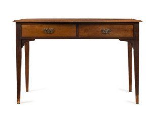 A two drawer desk with serpentine front, blackwood, circa 1900