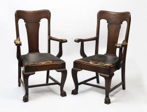 A pair of oak carver chairs in the Chippendale style made for the office of Sir Charles George Latham (1882-1968)