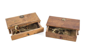 Two sets of gold scales mounted on timber boxes, 19th century