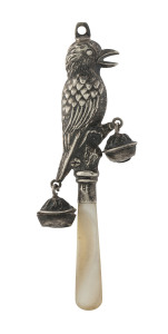 A baby's rattle in the form of a kookaburra with gumnut bells, sterling silver and mother of pearl