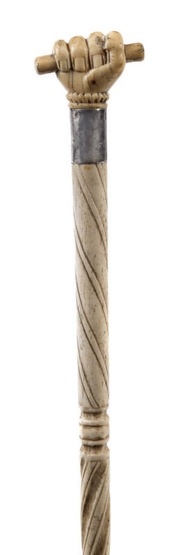 A whalebone walking stick with whales tooth carved fist handle and silver collar, 19th century