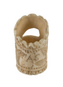 A rare scrimshaw whalebone toggle decorated with deer and floral motif, monogrammed "A. S", North American, 19th century - 2