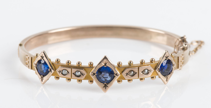 WILLIS BROTHERS, Melbourne antique 9ct gold bangle set with three impressive sapphires and seed pearls, circa 1870