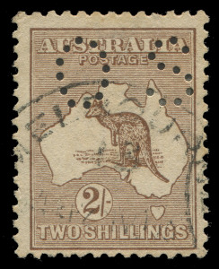 COMMONWEALTH OF AUSTRALIA: Kangaroos - Third Watermark: 2/- Brown, perforated OS, with WATERMARK INVERTED, FU at MELBOURNE with partial cds. Rare thus. BW:37aba - Cat.$1500.