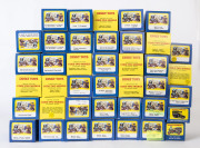 MATCHBOX/DINKY: A group of forty Matchbox/Dinky Code 2 models in yellow/blue boxes including Commer Van (OXO) 2006 Dinky Convention, Hershey 2004 Auburn, Leipzig 2003 VW Beetle; all mint and boxed.