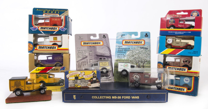 MATCHBOX: A collection of approximately sixty-five Matchbox MB-38 vans with various liveries including 'Beechworth Bakery', 'Big Ben', 'York Fair'; together with reference book 'Collecting MB-38 Ford Vans'; all mint with opened original packaging.