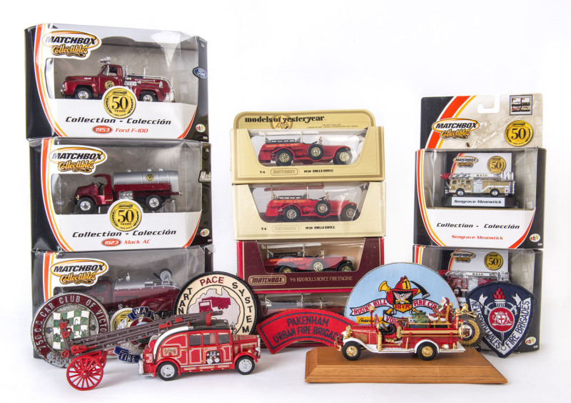 MATCHBOX: A collection of fire service related items including three Matchbox "Models of Yesteryear" Y6 1920 Rolls Royce Fire Engines, Matchbox Collectibles Ford F-100, Mack AC; together with fire badges and patches; all mint in opened original packaging.