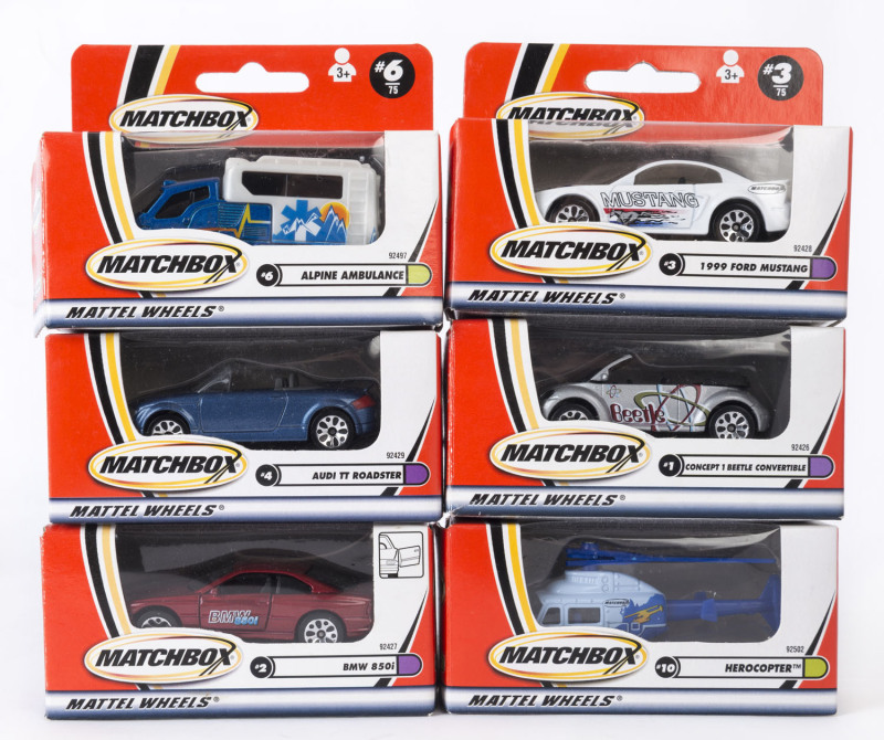 MATCHBOX: A group of approximately 100 Matchbox cars in orange boxes from the 1998 series; all mint in opened original packaging.