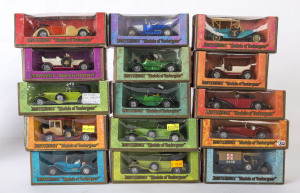 MATCHBOX: A group of approximately thirty-six Matchbox "Models of Yesteryear" in woodgrain window boxes including Mercedes-Benz SS, Jaguar SS 100; all mint most boxed.