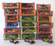 MATCHBOX: A group of approximately thirty-six Matchbox "Models of Yesteryear" in woodgrain window boxes including Mercedes-Benz SS, Jaguar SS 100; all mint most boxed. - 2