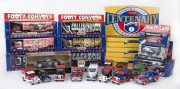 MATCHBOX: A group of approximately twenty-seven Matchbox AFL trucks, MB-38 vans and giftsets; all mint, some with original opened packaging.