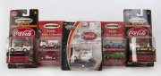 MATCHBOX: A group of Matchbox Coca-Cola cars including FJ Panel Van, Chevy Corvette, Pontiac GTO; all mint in original opened packaging (15 items).