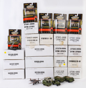 MATCHBOX: A group of Matchbox military items including P38J Lockheed Lightning and P51D Mustang warplanes, Model 'T' Ford ambulance, military humvee; most mint and in opened original packaging (25 items approx.).
