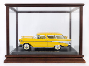 MATCHBOX: Matchbox 1/18 scale 1957 Chevrolet Nomad in yellow; with glass display case.