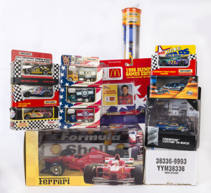 MISCELLANEOUS: An assortment of approximately forty models including Hotwheels Ferrari F1, Matchbox giftset, Matchbox 'Super Stars'; all mint in opened original packaging.