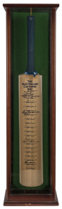 THE AUSTRALIAN CAPTAINS BAT: A full-sized bat displaying the original signatures of 19 different Australian Cricket Team captains from Bradman to Taylor. The bat is displayed in a custom-built display box. Height: 96cm. Some signatures are faded; fully legible signatures include Bradman, Brown, Lindwall, Jarman and Border.