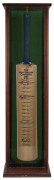 THE AUSTRALIAN CAPTAINS BAT: A full-sized bat displaying the original signatures of 19 different Australian Cricket Team captains from Bradman to Taylor. The bat&nbsp;is displayed in a custom-built display box. Height: 96cm. Some signatures are faded; fully le