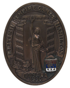 1st BRITISH EMPIRE GAMES, HAMILTON, CANADA 1930: Participation Medal in bronze & enamel; 39 x 50mm, reverse engraved "H. Mizler OXFORD and ST.GEORGES CLUB 1930"Hyman Barnett "Harry" Mizler (GBR) won Gold in Boxing - Bantamweight at Hamilton. He went on to represent Great Britain at the 1932 Olympics. He was born in the heart of the East End of London to Jewish parents. They had a fish stall in Watney Street Market and after leaving school he worked in the stall along with his brothers Moe a