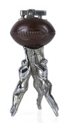An Australian rules football novelty table cigar lighter, chromed and anodized metal, mid 20th century,&nbsp;