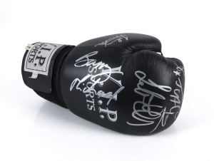 AUSTRALIAN BOXERS: A 16oz leather V.I.P. Sports boxing glove (black) signed in silver by Jeff Fenech, Barry Michael, John Famechon, Lester Ellis and Lionel Rose.