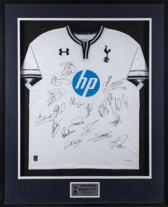 TOTTENHAM HOTSPUR FOOTBALL CLUB: 2013/14 Home Jersey signed by 20 members of the squad; framed & glazed, overall 104.5 x 85cm.