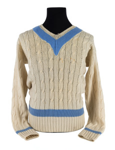 1970 WORLD XI long-sleeved jumper by Jaeger; accompanied by a printed Christmas card "from the World XI". Superb condition. In the 1970 English cricket season, a scheduled South African tour was cancelled for political reasons. As this meant there would be no international cricket in England that season, a Rest of the World team was assembled (under the management of Australian Bill Jacobs) to play a series of five-day matches against England. At the time, they were played as Test matches, but