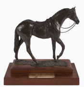 HORSE RACING TROPHY: Figurine of racehorse, signed on base by artist Harry Pinsent, on wooden base with plaque affixed "Newcastle Jockey Club/ Spring Carnival/ New Cameron Handicap-1400m/ 1996", overall 19x29cm, awarded to John Hawkes, trainer of Cohort.