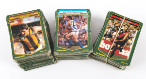 1985 SCANLENS: A quantity of the "Footballers" cards in mixed condition; not quite a complete set but many present in multiples. (310+).