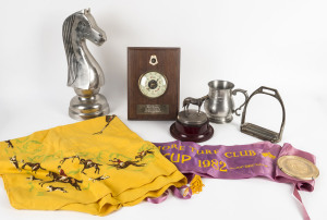 HORSE RACING GROUP including silver-plated horse on wooden plinth, with plaque engraved "Presented to, A.H.McNabb Esq, by the Red Cliffs Turf Club, in appreciation of services rendered. President 1930-1936". 13cm tall; two Rollo Roylance trophies presented by the Ballarat Turf Club; Document of Description "Perfect Harmony";