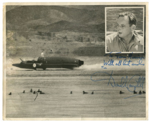 DONALD CAMPBELL: A group comprising a 1956 two-page letter on his personal letterhead regarding the writer's ingenious idea for a new method of attachment for automobile road wheels; two postcards of 'Bluebird K7'; plus large photograph of 'Bluebird K7' with inset portrait. All 4 items are signed in ink by Campbell. Donald Campbell (British; 1921-1967) set eight absolute world speed records on water and land in the 1950s & 1960s. He remains the only person to set both land and water sp